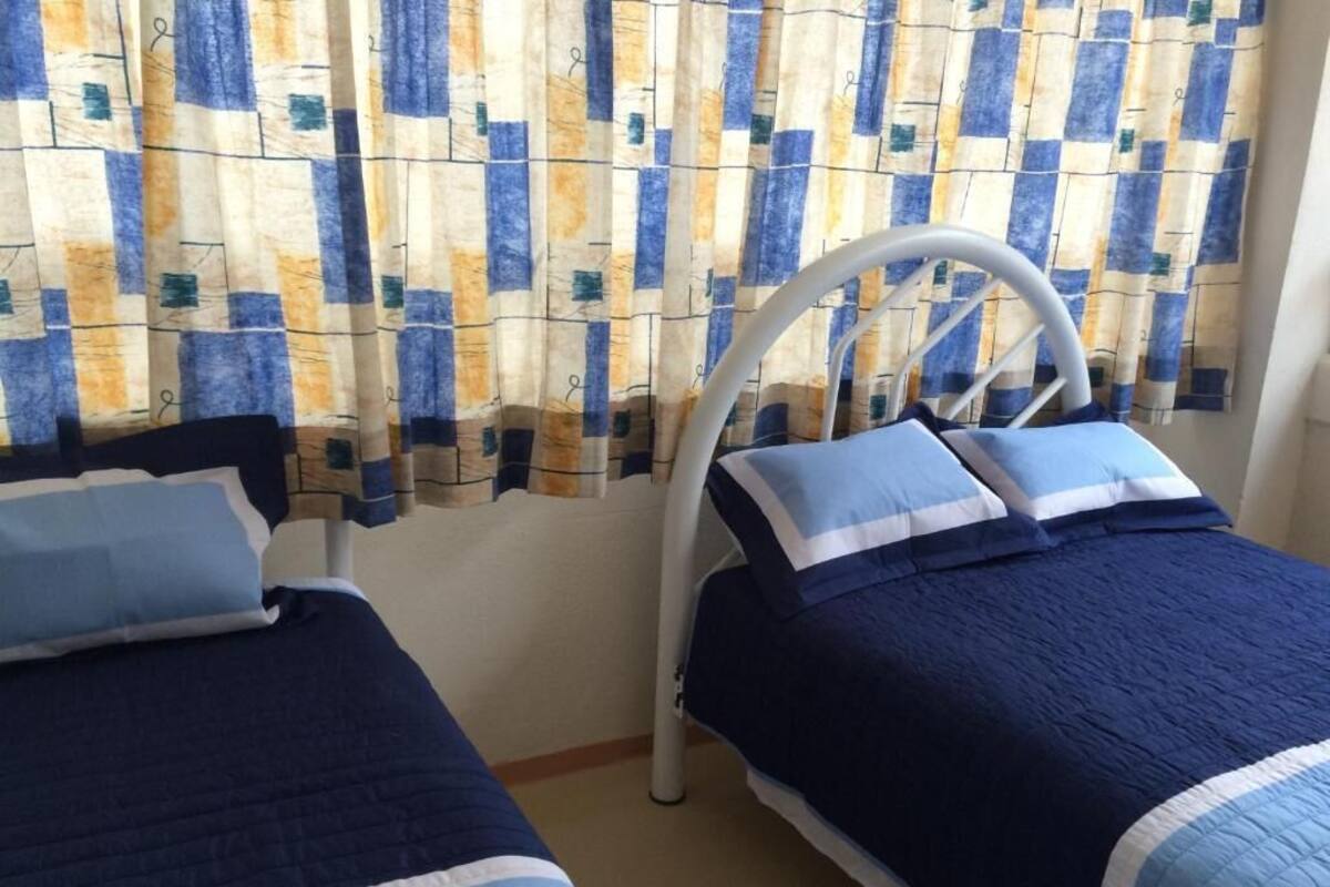 Private Deluxe Room with Kitchen and Shared Bathroom