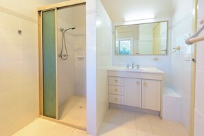 Shower, towels, toilet paper