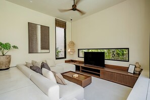 Luxury Villa, Pool View | Living area | 55-inch flat-screen TV with cable channels