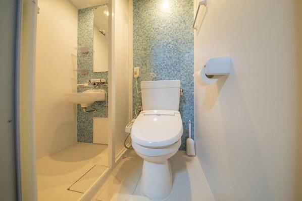 Hair dryer, slippers, towels, soap