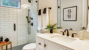 Shower, hair dryer, towels, soap