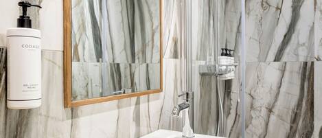 Apartment, City View | Bathroom | Eco-friendly toiletries, hair dryer, towels, soap