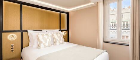 Hypo-allergenic bedding, pillow-top beds, in-room safe