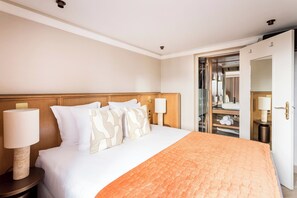 Apartment, City View | Hypo-allergenic bedding, pillowtop beds, in-room safe