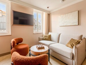 Apartamento, vista para a cidade | Área de estar