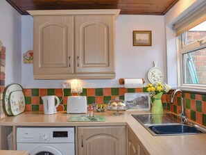 Highchair, cookware/dishes/utensils