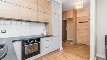 Apartamento conforto, sacada | Cozinha privada