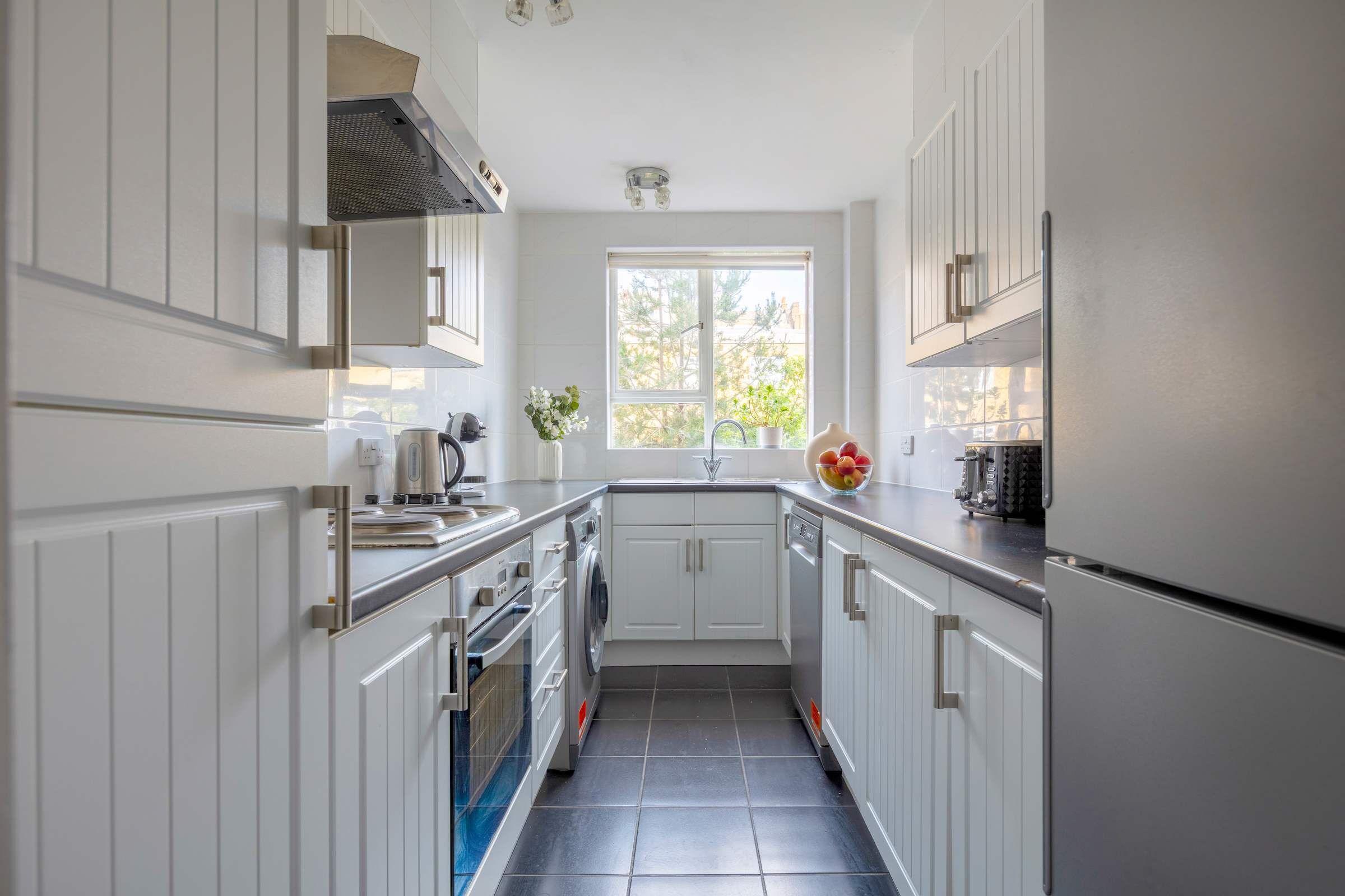 Refrigerador, microondas, horno y parrilla de estufa 