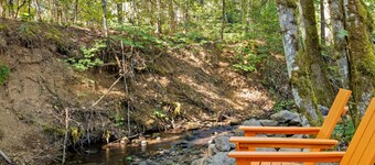 Private 6.5 acre property with private creek, EV Charger, Hot Tub, Game Room, Cottage