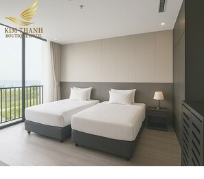 Chambre Deluxe Double ou avec lits jumeaux, vue mer | Minibar, coffres-forts dans les chambres, bureau