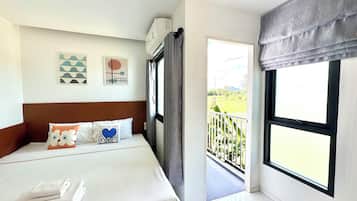 Eenvoudige kamer, 1 kingsize bed, balkon, uitzicht op tuin | Uitzicht op de tuin
