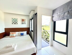 Basic Room, 1 King Bed, Balcony, Garden View | Garden view - UDOMSAP PLACE (Sattahip)