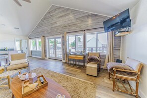 TV, fireplace, books, stereo