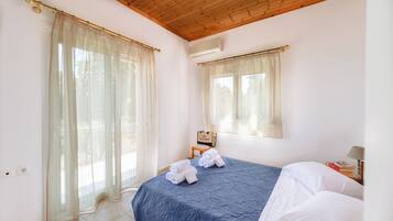 Family House, Multiple Bedrooms (To Pournari Beachside Garden House) | 2 bedrooms, iron/ironing board, free WiFi, bed sheets