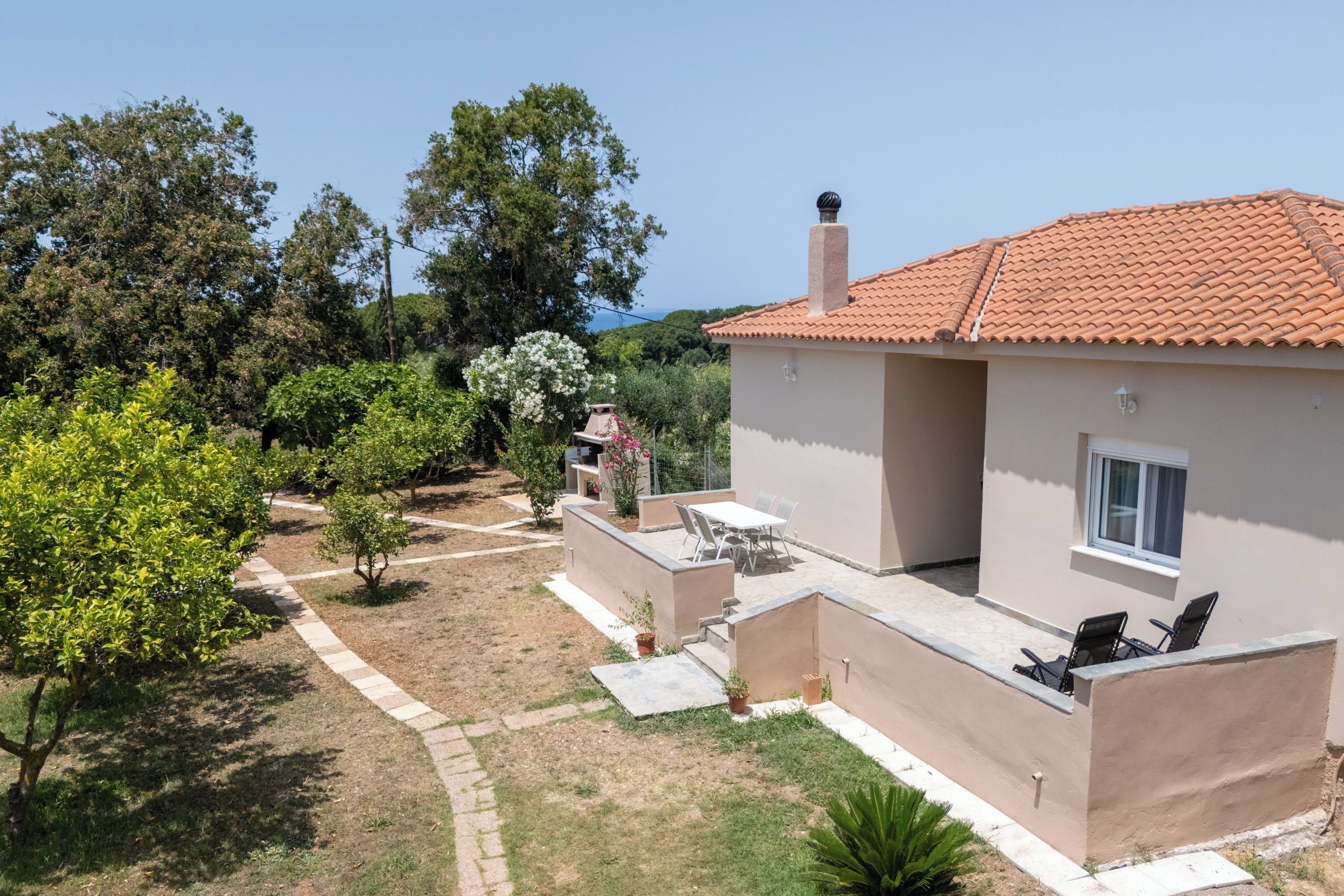 Family House, Multiple Bedrooms (To Pournari Beachside Garden House) | Outdoor dining