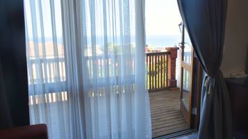 Comfort Room, Beach View | Desk, laptop workspace, soundproofing, iron/ironing board