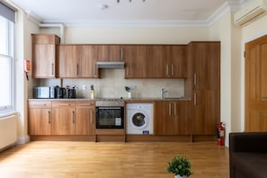 Departamento Confort, baño privado | Cocina privada | Frigobar, microondas, parrilla de estufa y utensilios de cocina