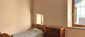 Self-catering cottage in renovated Vosges farmhouse between town and forest.