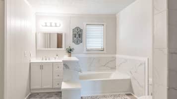 Shower, hair dryer, towels, shampoo