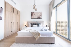 In-room safe, iron/ironing board, free WiFi, bed sheets - New Studio Close to Town Square Park, Short Drive to Al Qudra Lake by Deluxe Holiday Homes (Dubai)