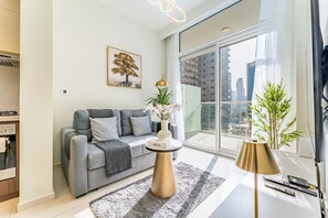 TV - Furnished 1BR Near Burj Khalifa, Dubai Canal & Metro Station, Vera Tower by Deluxe Holiday Homes (Dubai)