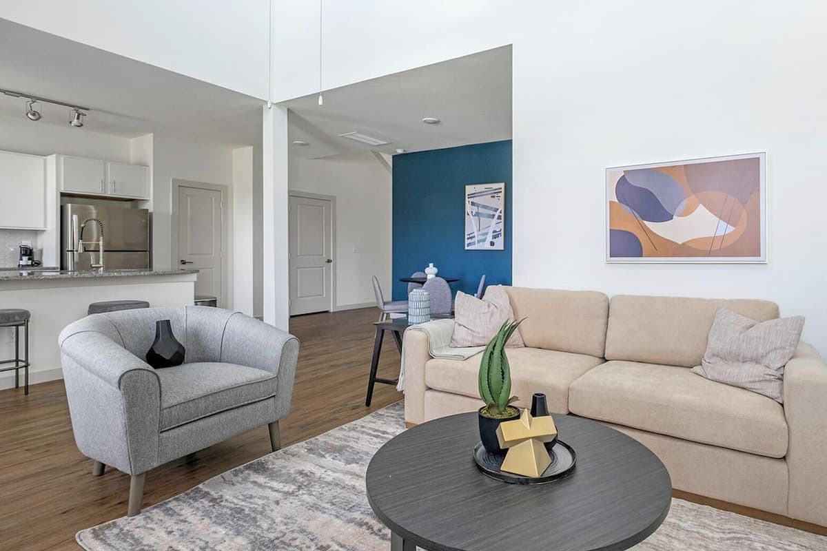 Apartment, 3 Bedrooms (3 QueenBed) | Living area | 50-inch TV with digital channels