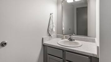 Apartment, 1 Bedroom | Bathroom | Free toiletries, hair dryer, towels, soap