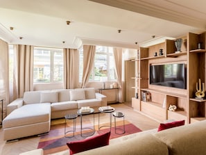 Apartamento, vistas a la ciudad | Zona de estar