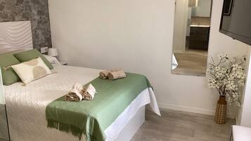 1 slaapkamer, een strijkplank/strijkijzer, wifi, beddengoed