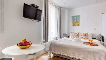 1 bedroom, desk, iron/ironing board, travel crib