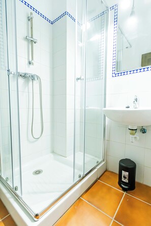 Shower, towels, soap, shampoo