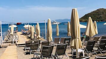 Private beach, sun loungers, beach umbrellas, beach towels