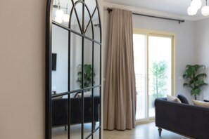 Interior - Cozy & Calm 1BR | Balcony Views in Lotus | Travelholic Stay (Lotus)