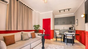 Smart TV - The Ruby 1BR | Elegant Stay in Lotus | Travelholic Stays (Lotus)