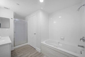 Shower, hair dryer, bidet, towels