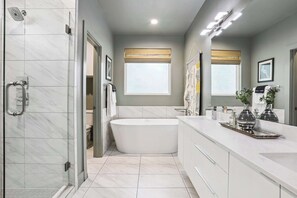Shower, hair dryer, towels, shampoo