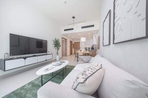 TV - StayShort - JVC apartment sleeps 4 and features a balcony (Jumeirah Village Circle)