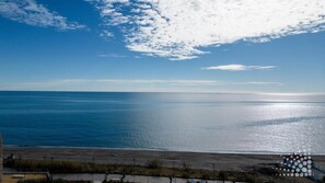 On the beach, beach towels