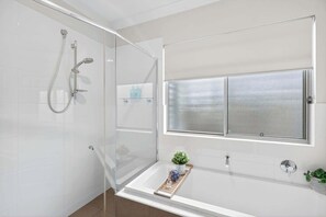 Shower, hair dryer, towels
