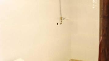 Shower, slippers, towels, soap