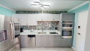 Fridge, oven, coffee/tea maker, toaster