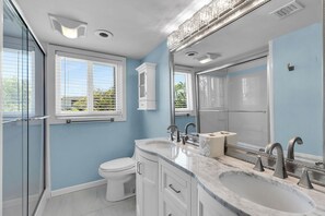 Hair dryer, towels, soap, toilet paper
