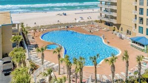 A hotel with a pool, beach access, and a view of the ocean. - Skywaves Escape 2503-Stunning Views-Sleeps 5 (Panama City Beach)