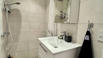 Hair dryer, towels, soap, shampoo