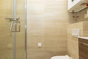 Ducha y secador de pelo