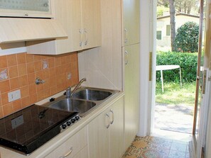 Fridge, stovetop, coffee/tea maker, cookware/dishes/utensils