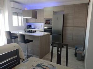 Fridge, microwave, oven, dishwasher