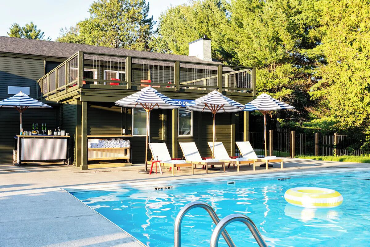 Soak up poolside relaxation with shaded loungers and deck seating.