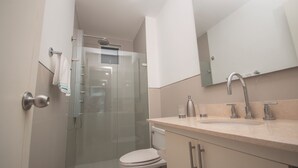 Shower, towels, soap, toilet paper