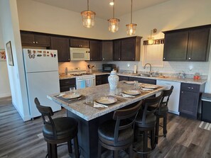 Fridge, microwave, oven, stovetop - Brand New Barndominium on 40 Acres with Private Lake (Evart)